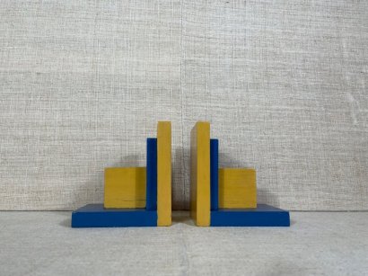 FERMA LIBRI IN LEGNO GIALLO E BLU